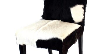 Stuhl “Kitzbühel” mit echtem Fellbezug (schwarz/weiss) Stuhl mit Fell