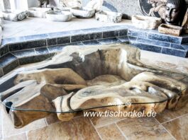 Coffee table made from a solid tree stump Coffee table made from a tree stump