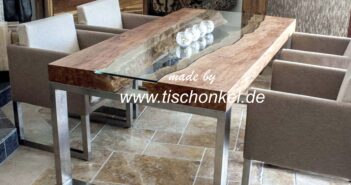 Designtisch mit Edelstahl und Glas