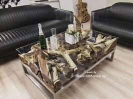 Salontafel van een boomwortel met roestvrij staal en glas Salontafel van een boomwortel