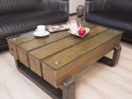 Extraordinary coffee table from the „Blocks“ series“ Extraordinary coffee table Blocks made of solid wood planks with a table frame made of raw steel