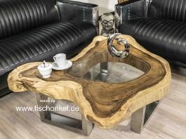 Couchtisch aus einem Baumstamm mit Baumkante Couchtisch aus einem Baumstamm mit Glas