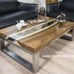 Schicker Couchtisch der Serie Elements mit Glasplatte und Edelstahlgestell