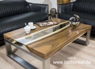 Schicker Couchtisch der Serie Elements mit Glasplatte und Edelstahlgestell Schicker Couchtisch der Serie Elements