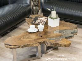 Couchtisch aus einer Baumscheibe Teak Couchtisch Teak Baumscheibe mit Edelstahlgestell und Glas