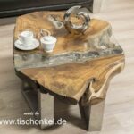 Zeitloser Couchtisch aus einem Baumstamm mit außergewöhnlichem Design