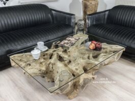 Schicker Couchtisch aus einer Baumwurzel Schicker Couchtisch aus einer Baumwurzel mit Glassplatte