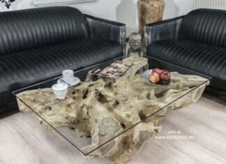 Schicker Couchtisch aus einer Baumwurzel Schicker Couchtisch aus einer Baumwurzel mit Glassplatte