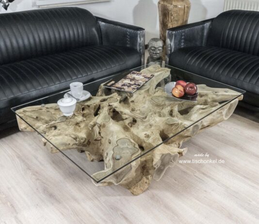 Schicker Couchtisch aus einer Baumwurzel Schicker Couchtisch aus einer Baumwurzel mit Glassplatte