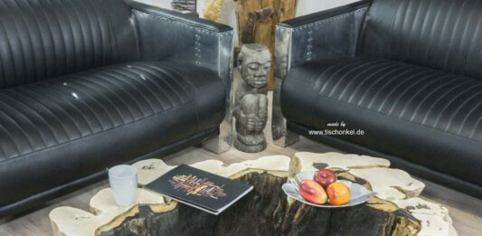 Einzelstück Couchtisch aus einem Baumstumpf halbrund mit Baumkante Einzelstück Couchtisch aus einem Baumstumpf halbrund mit Glasplatte