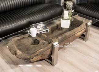 Einzigartiger Couchtisch aus einem antiken Reismörser mit Glasplatte Einzigartiger Couchtisch aus einem alten Reismörser