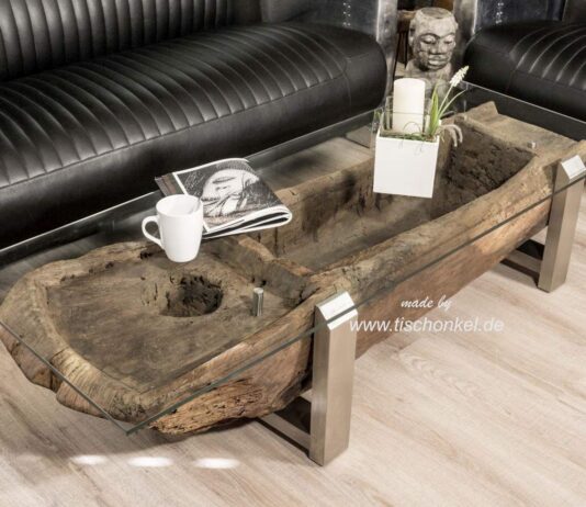 Einzigartiger Couchtisch aus einem antiken Reismörser mit Glasplatte Einzigartiger Couchtisch aus einem alten Reismörser