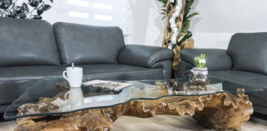 Esta impresionante mesa de café de madera fue fabricada con madera reciclada. Las vigas de madera maciza encoladas entre sí tienen en el centro...„ Mesa de café excepcional