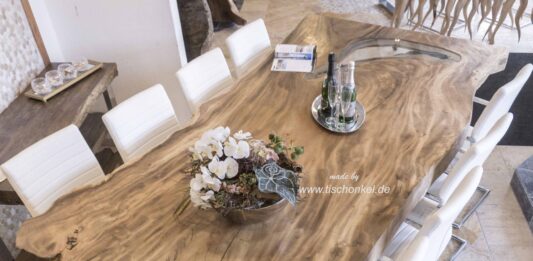 Solid dining table made from a log Solid dining table made from a log