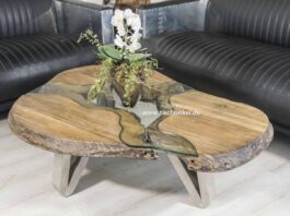 Teak Couchtisch auf stylischem Edelstahlgestell Teak Couchtisch auf Edelstahlgestell