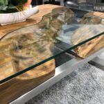 Massivholz Couchtisch mit Glaseinlage Wild Landscape