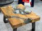 Preview: Couchtisch mit Glaseinlagen aus Baumscheiben