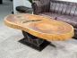 Preview: Massiver ovaler Couchtisch Baumstamm mit Metallgestell