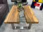Preview: Eckiger Couchtisch aus recyceltem Teakholz mit Glasplatte und Edelstahlbeinen.