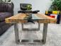 Preview: Eckiger Couchtisch aus recyceltem Teakholz mit Glas und Edelstahl.