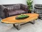 Preview: Massiver Couchtisch Baumstamm mit Metallgestell