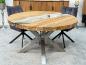Preview: Round dining table made of recycled wood with glass insert and stainless steel frame.