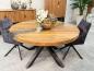 Preview: Round dining table made of recycled wood with glass and steel frame.