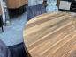 Preview: Round dining table made of recycled wood with glass and steel base.