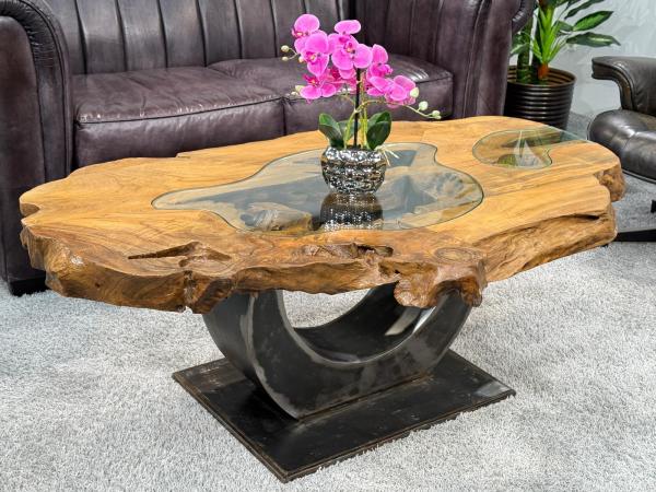 Einmaliger Couchtisch aus Baumscheiben mit Halbmondfuss