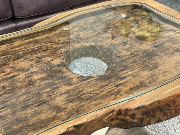 Antique coffee table from rice mortar with glass top, 101x70x50 cm.