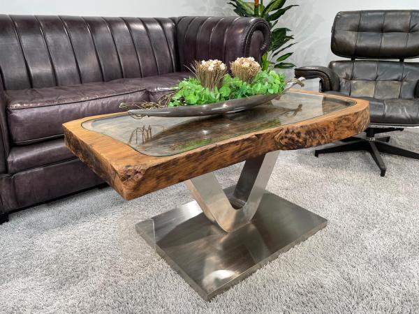 Antique coffee table from rice mortar, wooden top, metal base.