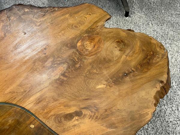Tree trunk coffee table with glass top, irregular shape