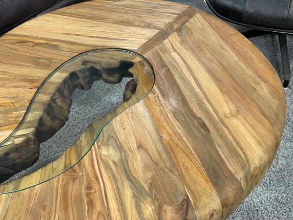 Round Bonsai coffee table with wood top and glass detail.