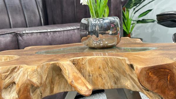 Wohnzimmertisch aus Teakholz mit Glasplatte, ca. 78 x 42 x 10 cm.