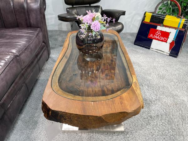 Coffee table from antique rice mortar, glass top, metal base