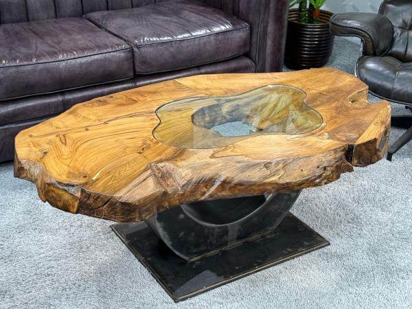 Einmaliger Couchtisch aus Teak Baumscheiben und Glas