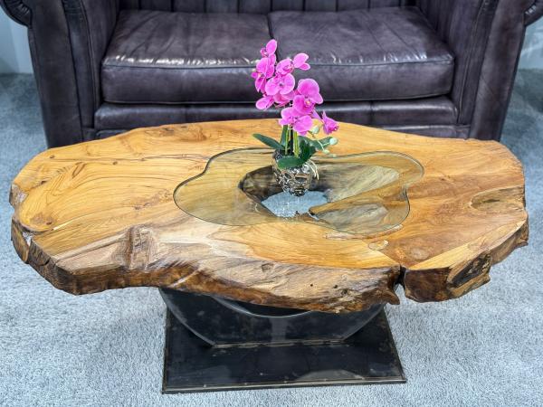 Einmaliger Couchtisch aus Teak Baumscheiben und Glas