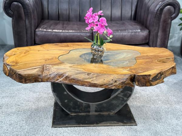Einmaliger Couchtisch aus Teak Baumscheiben und Glas