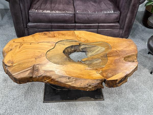 Einmaliger Couchtisch aus Teak Baumscheiben und Glas
