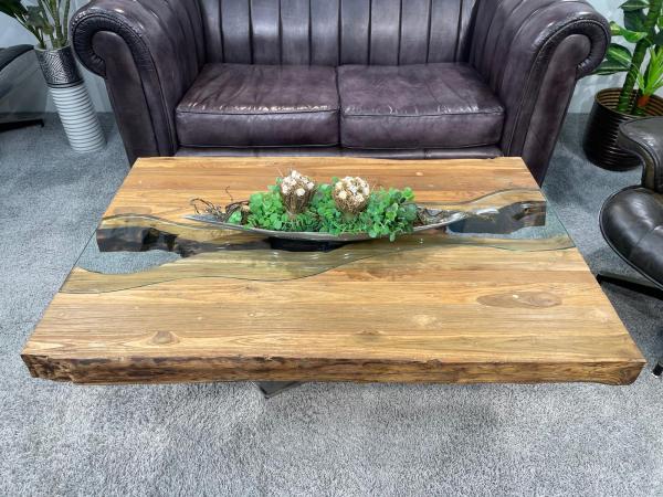 Wohnzimmertisch mit Glasmitte und Edelstahlgestell