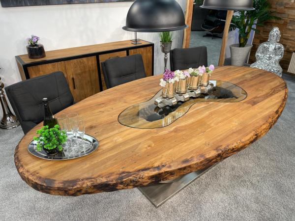Ovaler Designtisch aus Massivholz und vollmassiver Tischplatte