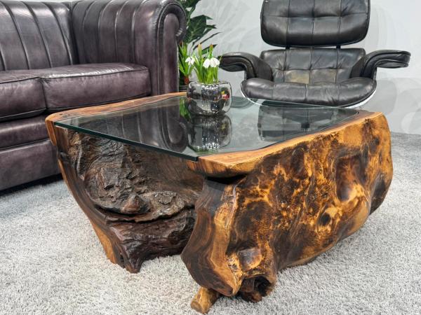 Living room table from Suar tree trunk with glass top, approx. 83x75x39 cm.