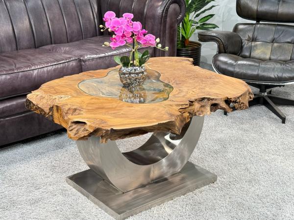 Einmaliger Couchtisch aus Baumscheiben mit Halbmondfuss
