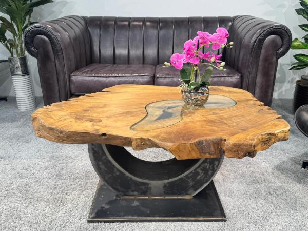 Solid wood coffee table with glass top, unique design
