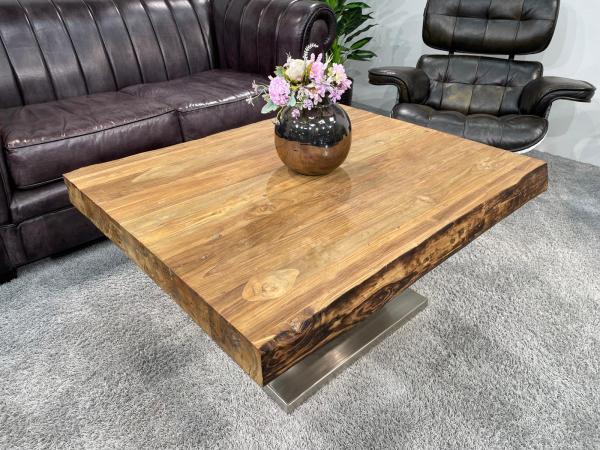 Solid wood coffee table made from recycled teak, rectangular.