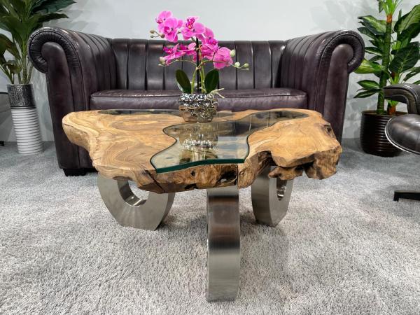 Coffee table with glass inlays and O-shaped steel legs