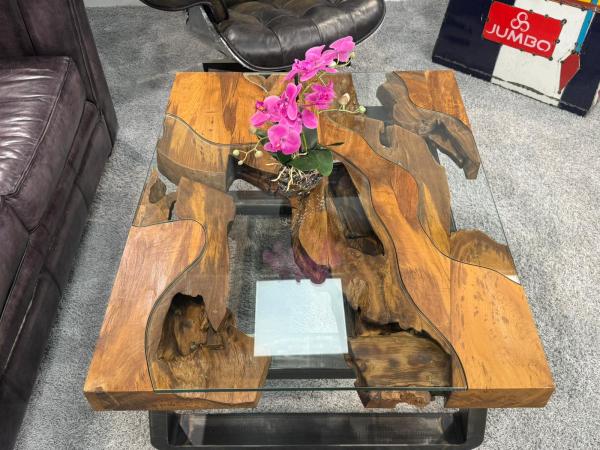 Bottom view of a coffee table with metal legs.