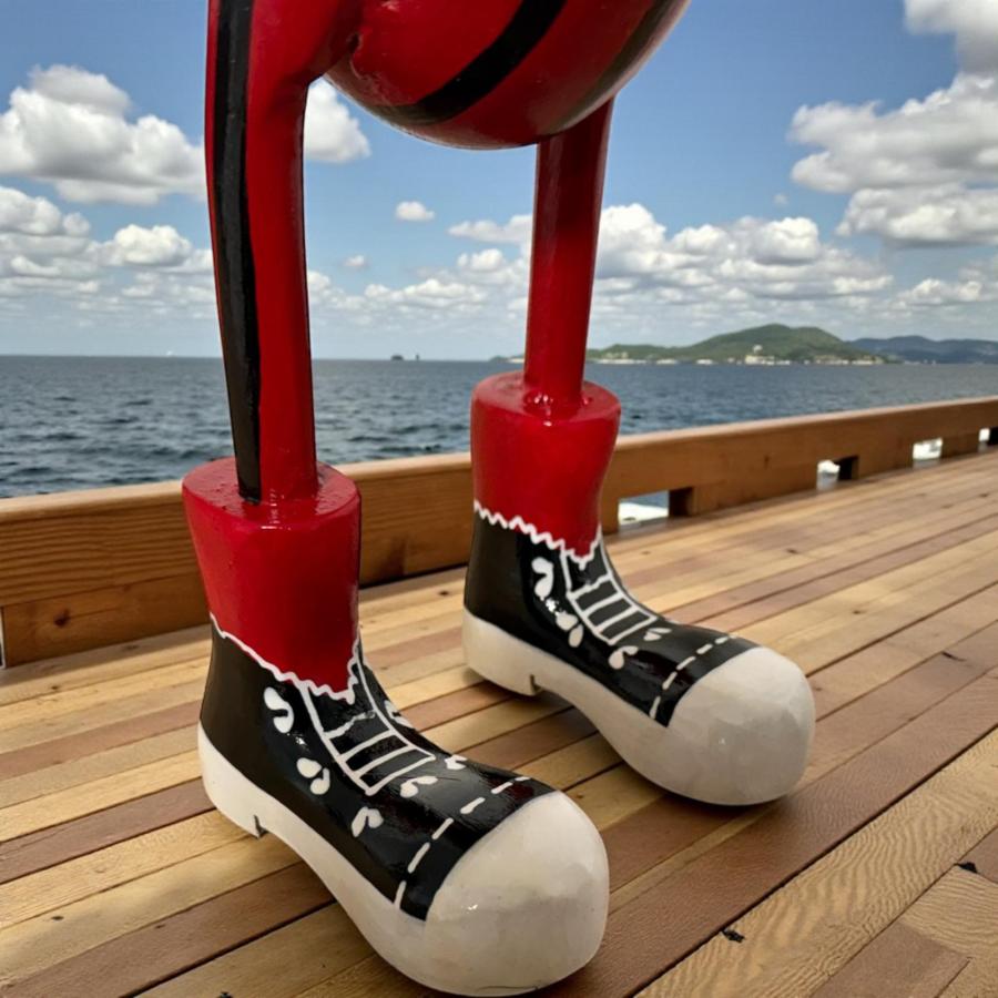 Ente aus Holz Pirat in Totenkopf-Anzug