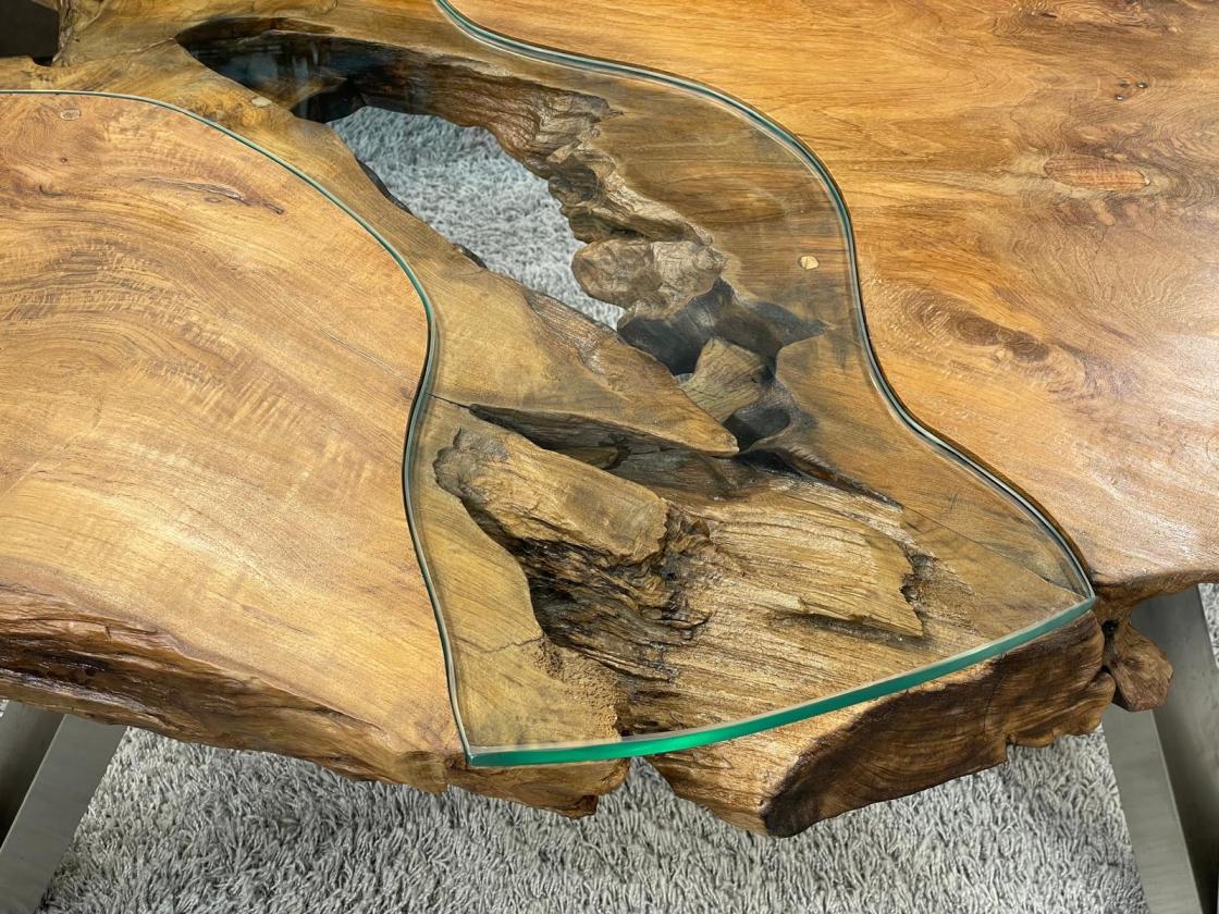 Tree trunk coffee table with glass top, irregular shape