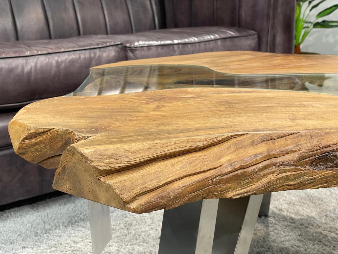 Tree trunk coffee table with glass top and metal legs
